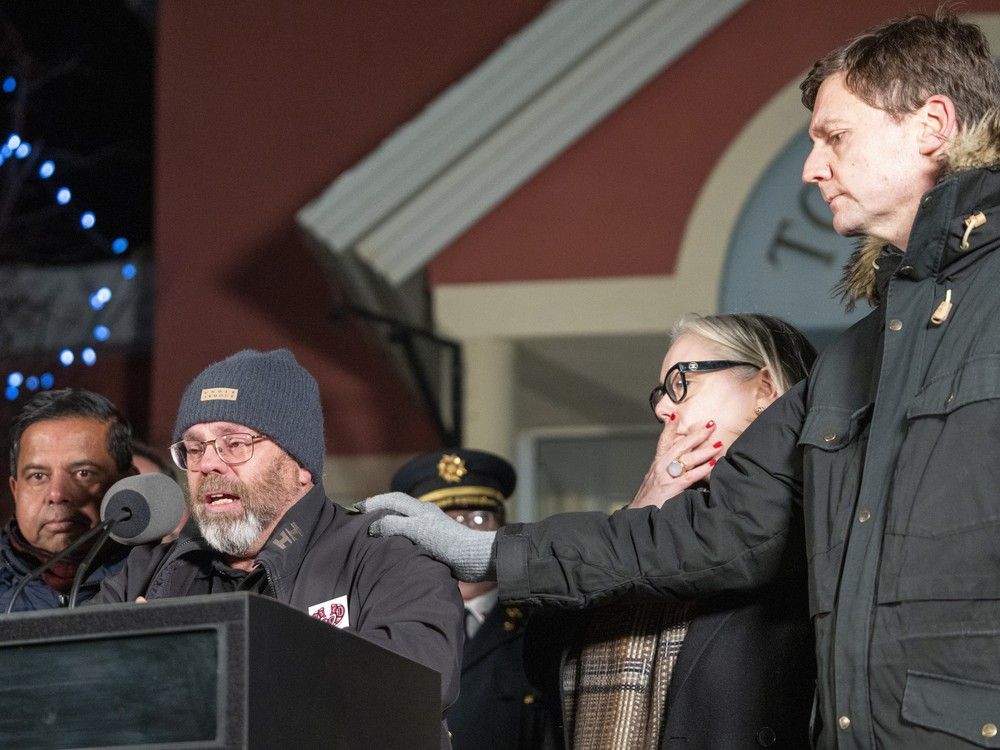  B.C. Premier David Eby comforts Tumbler Ridge Mayor Darryl Krakowka as he gets emotional while speaking at a press conference in Tumbler Ridge, B.C., where a mass shooting took place on Tuesday. Taken on Wednesday, Feb. 11, 2026.
