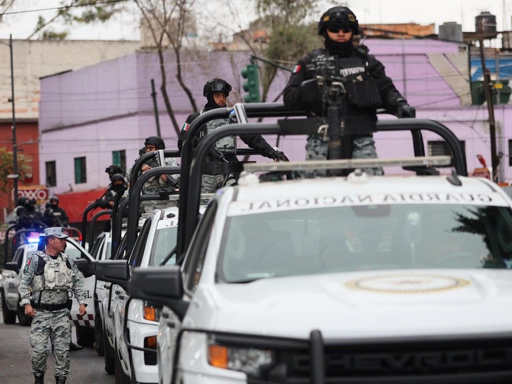  National Guards patrol the area outside of the General Prosecutor’s headquarters in Mexico City, Sunday, Feb. 22, 2026, after authorities reported that the Mexican Army killed Jalisco New Generation Cartel leader Nemesio Oseguera, known as “El Mencho.”