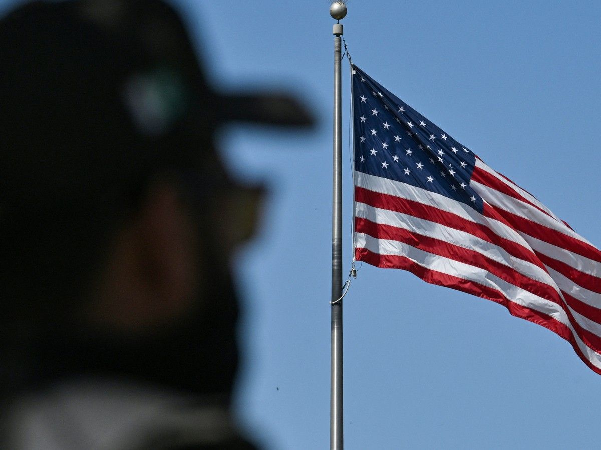A police personnel stands guard outside the US consulate in Karachi on March 4, 2026, following violent demonstrations across Pakistan over the US-Israel strikes on Iran. A police personnel stands guard outside the US consulate in Karachi on March 4, 2026, following violent demonstrations across Pakistan over the US-Israel strikes on Iran.