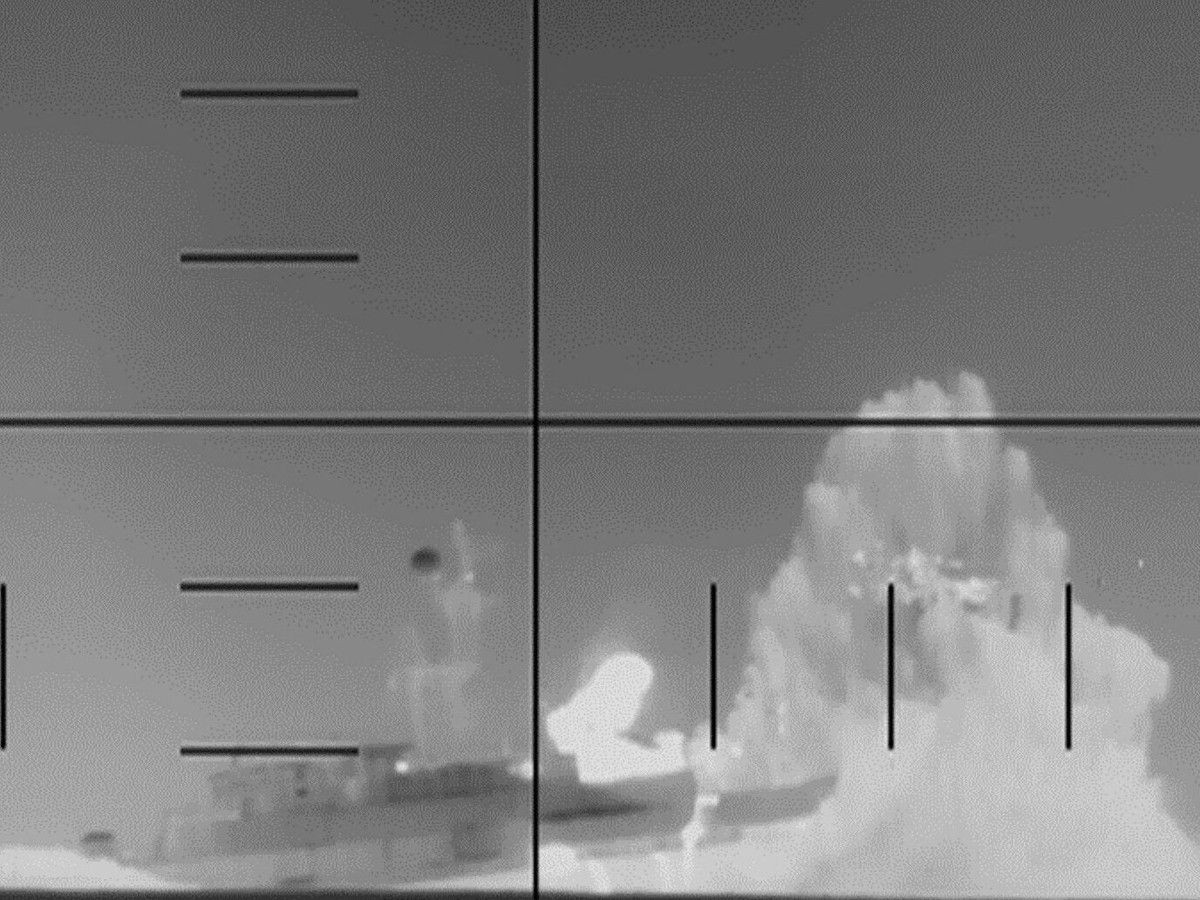 This frame grab from a video released by the US Department of Defense on March 4, 2026, shows what the Department of Defense says is periscope footage of a US Navy submarine firing on and sinking an Iranian warship in the Indian Ocean. This frame grab from a video released by the US Department of Defense on March 4, 2026, shows what the Department of Defense says is periscope footage of a US Navy submarine firing on and sinking an Iranian warship in the Indian Ocean.