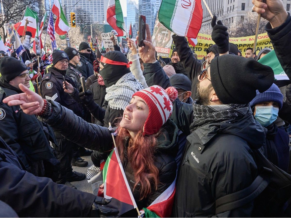  Al-Quds Day protesters, right, were met with a sizeable counter protest near the U.S. Consulate in Toronto, Ontario, on March 14, 2026.