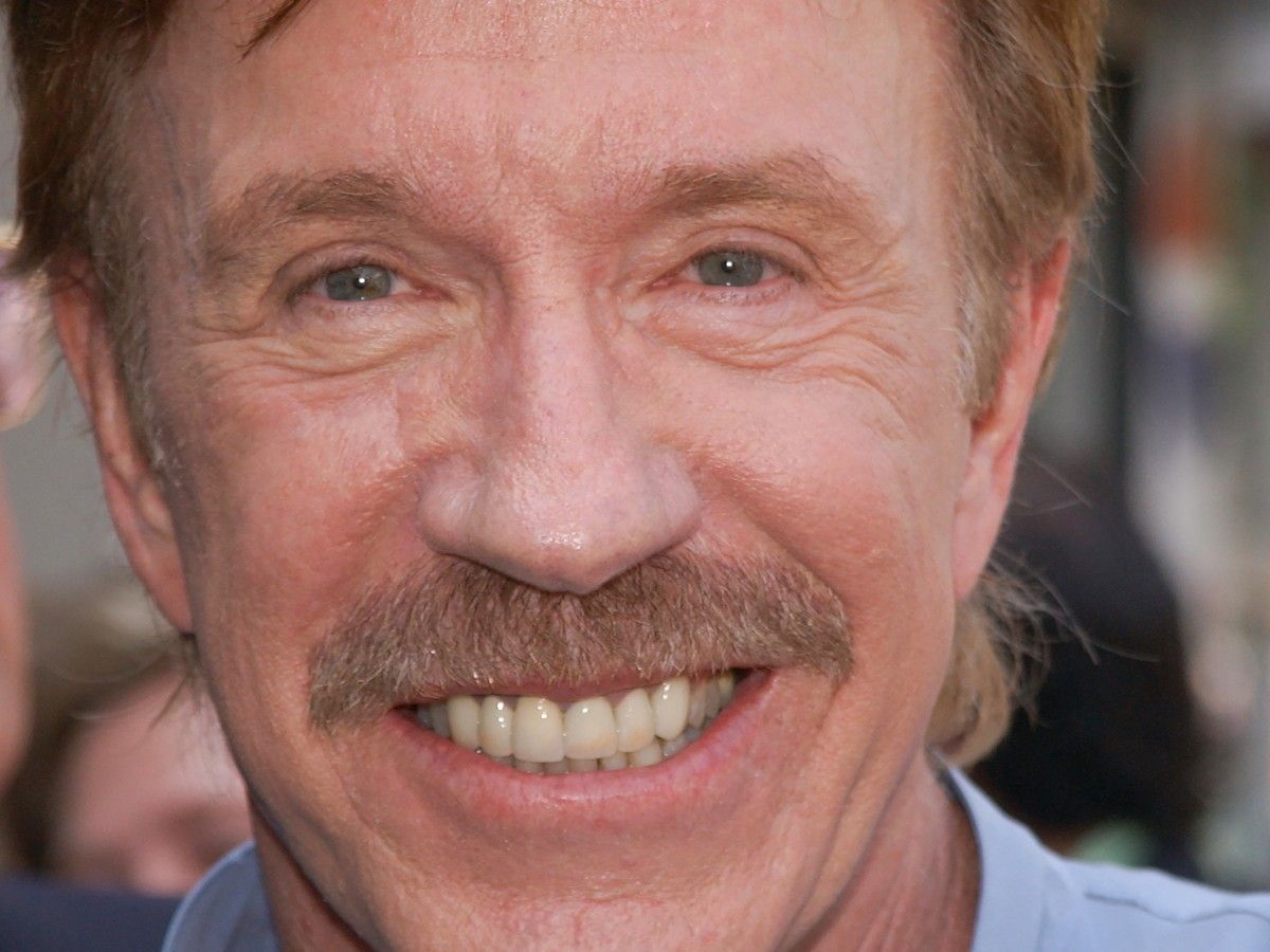 This picture taken on Aug. 27, 2002 shows U.S. actor Chuck Norris attending Michael Bolton's Hollywood Walk of Fame star ceremony in Hollywood, California. 