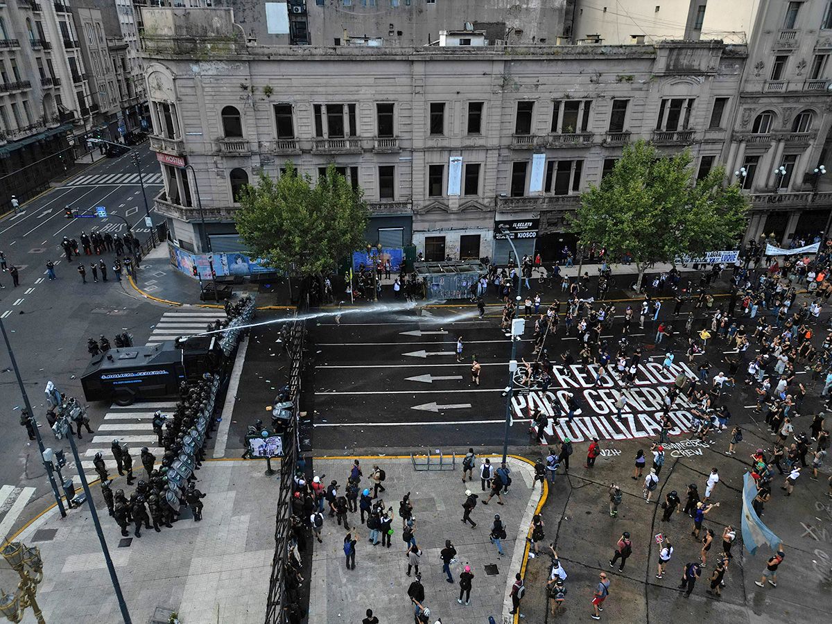 Police clash with protesters outside the Congress building where Argentina’s President Javier Milei’s labour reform bill was being debated, in Buenos Aires on Feb. 19, 2026.