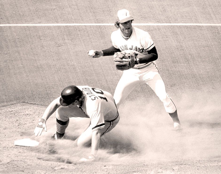 When the dust cleared Detroit Tigers' designated hitter Rusty Staub found himself involved in the first half of a double play at second as Toronto Blue Jays' Bob Bailor prepares to toss the ball to first to complete the action at a 1977 game.