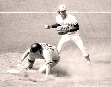When the dust cleared Detroit Tigers' designated hitter Rusty Staub found himself involved in the first half of a double play at second as Toronto Blue Jays' Bob Bailor prepares to toss the ball to first to complete the action at a 1977 game.