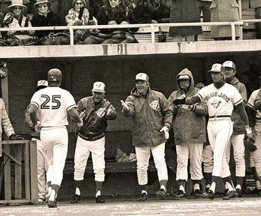 Doug Ault is congratulated for hitting the first run in the history of the Toronto Blue Jays on April 7, 1977.