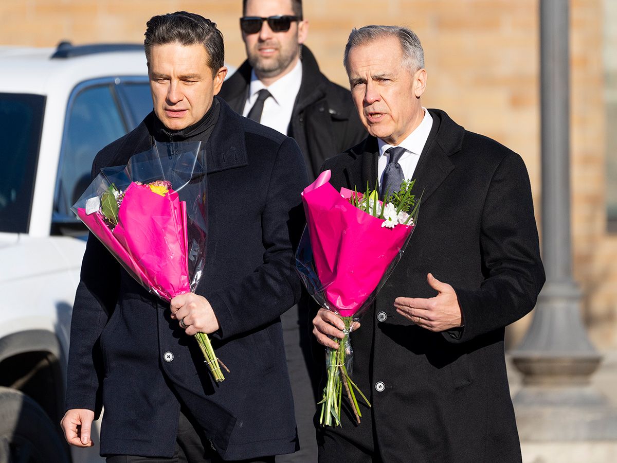 Conservative Party Leader Pierre Poilievre and Prime Minister Mark Carney walk towards a memorial set up to honour the shooting victims in Tumbler Ridge, B.C. on Feb. 13, 2026. Conservative Party Leader Pierre Poilievre and Prime Minister Mark Carney walk towards a memorial set up to honour the shooting victims in Tumbler Ridge, B.C. on Feb. 13, 2026.