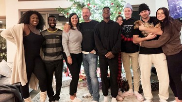 Maddox Bentley, centre, with his parents, Gord and Leanne, and his four siblings and their partners in a Bentley family portrait in 2025.