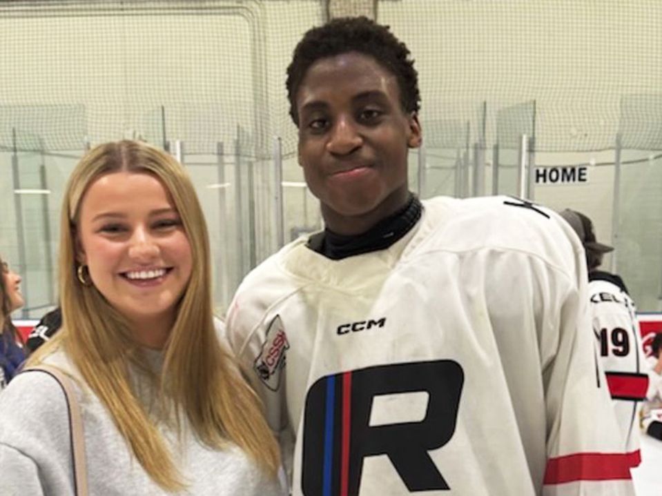 Maddox Bentley in his hockey gear, with his sister, Tessa Bentley.