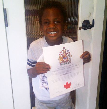 Young Maddox Bentley with his Canadian citizenship certificate.