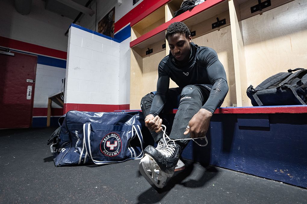 Maddox Bentley, 17, ties his skates at Summit Centre ice rink in Abbotsford, B.C., on Tuesday, Feb. 17, 2026.