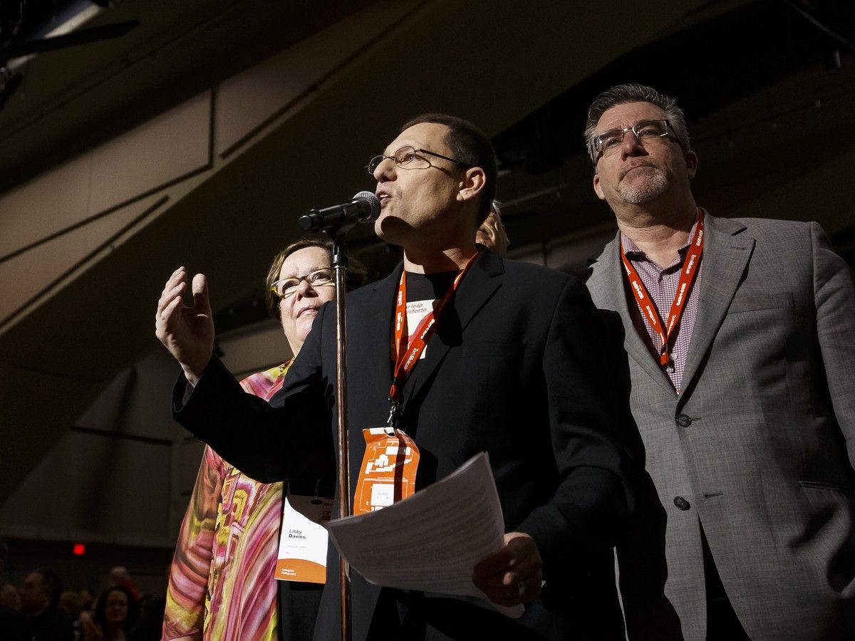  Delegate Avi Lewis (left) speaks in support of the Leap Manifesto during the Edmonton 2016 NDP national convention at Shaw Conference Centre in Edmonton, Alta., in 2016.