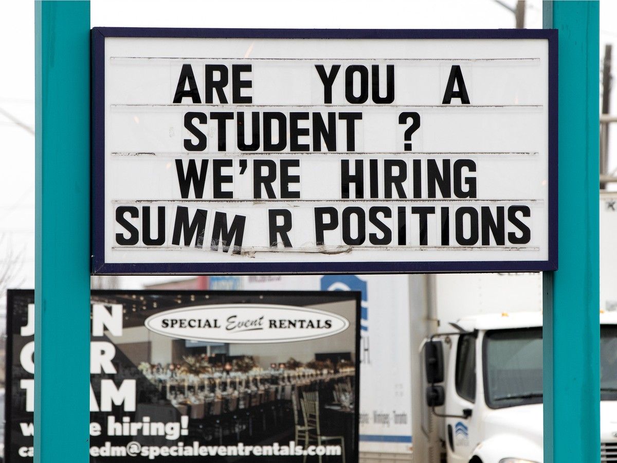 A sign in Edmonton advertises for student summer employment, a positive note in an ongoing tough labour market for Canada's youth, according to Statistics Canada.