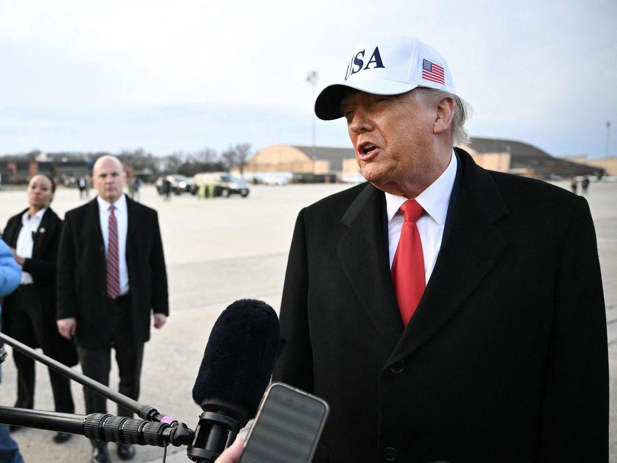 US President Donald Trump speaks to the press upon returning to Joint Base Andrews in Maryland on January 13, 2026. 