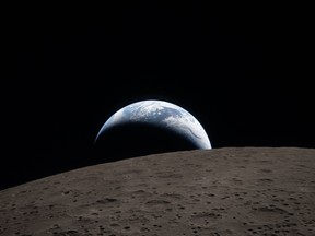 Earthset captured through the Orion spacecraft