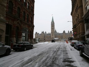 Parliament of Canada is pictured with empty street during morning rush hour March 23, 2020 in Ottawa, Canada.