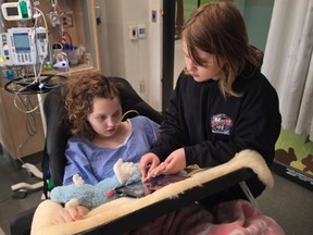 Maya Gebala and her sister in hospital