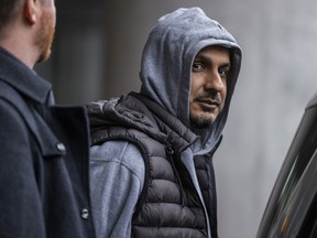 Arsalan Chaudhary wearing a hoodie and vest