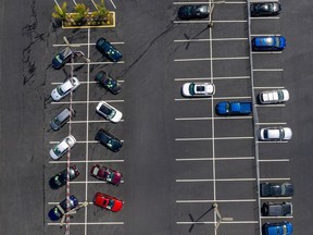 Birdseye view of a half empty parking lot