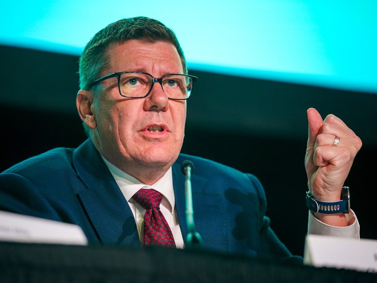 Saskatchewan Premier Scott Moe gestures while speaking during a question and answer period with cabinet ministers at Saskatchewan Urban Municipalities Association Convention in Regina, on Wednesday, April 15, 2026.