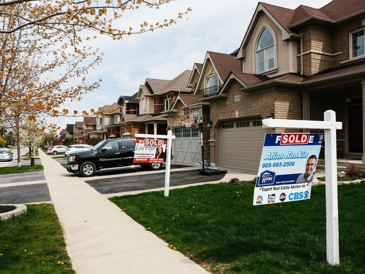 Housing prices would be 10% lower if Canada had kept pace with U.S., CMHC says