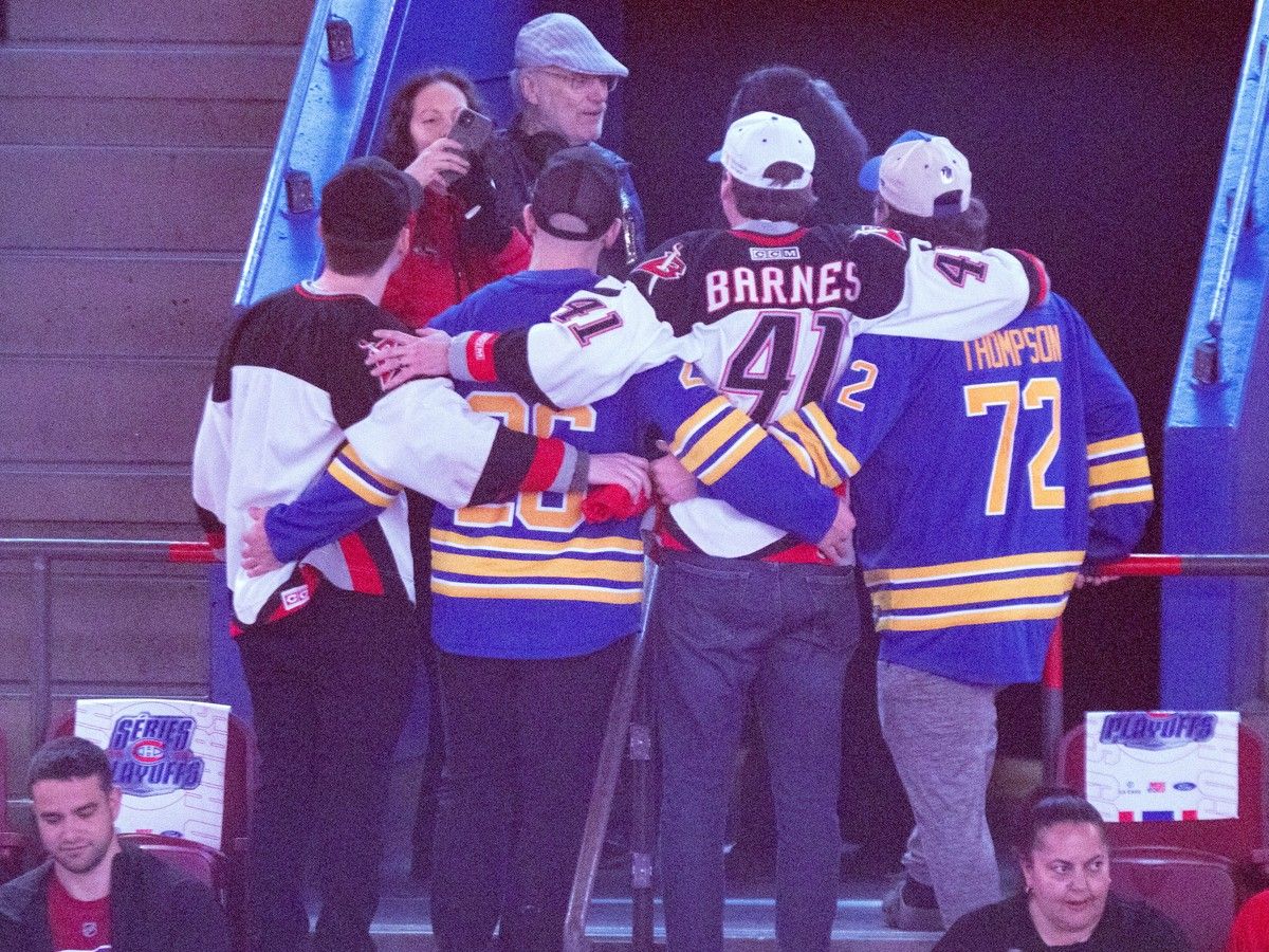  Buffalo Sabres fans have a group photo taken in the Bell Centre prior to Game 3 of the National Hockey League playoff series against the Canadiens in Montreal Sunday May 10, 2026.