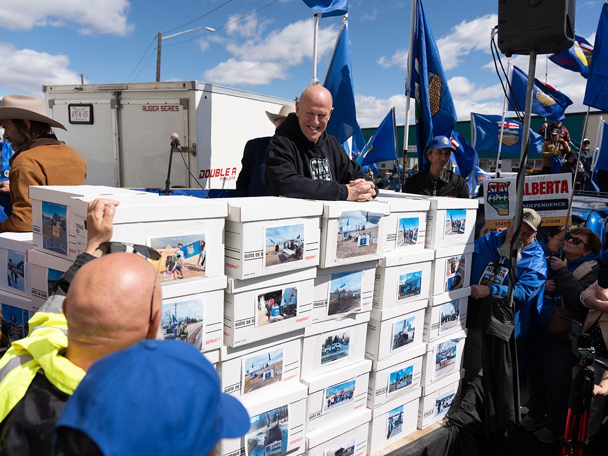 Boxes of signatures at a rally.