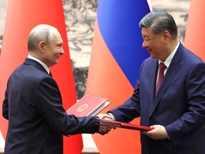 Vladimir Putin and Xi Jinping.