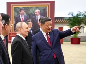 Vladimir Putin and Xi Jinping.