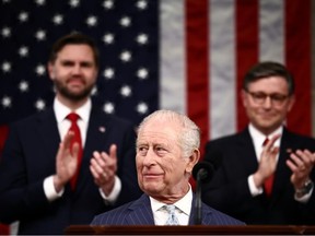 KIng charles, foreground, with JD, left, and Mike Johnson, behind him