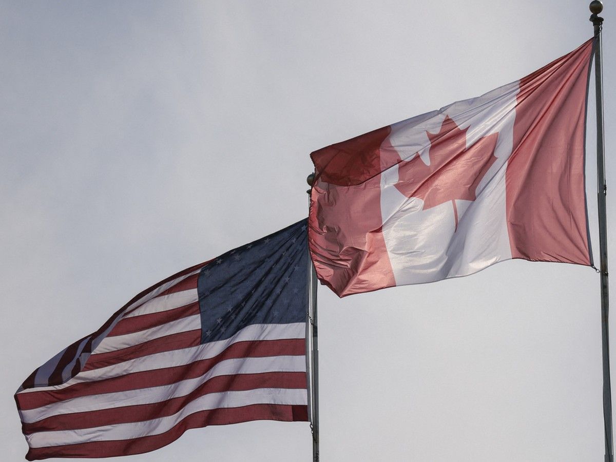 The US and Canadian flags pictured at Peace Arch Historical State Park in Blaine, Washington.
