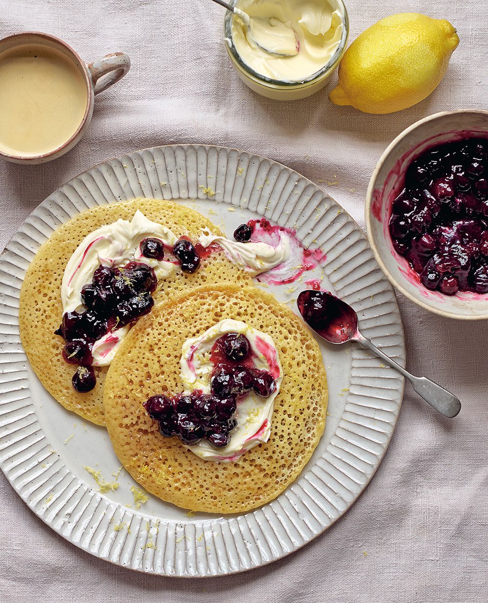 Honey-buttered pancakes with orange blossom and blueberry sauce