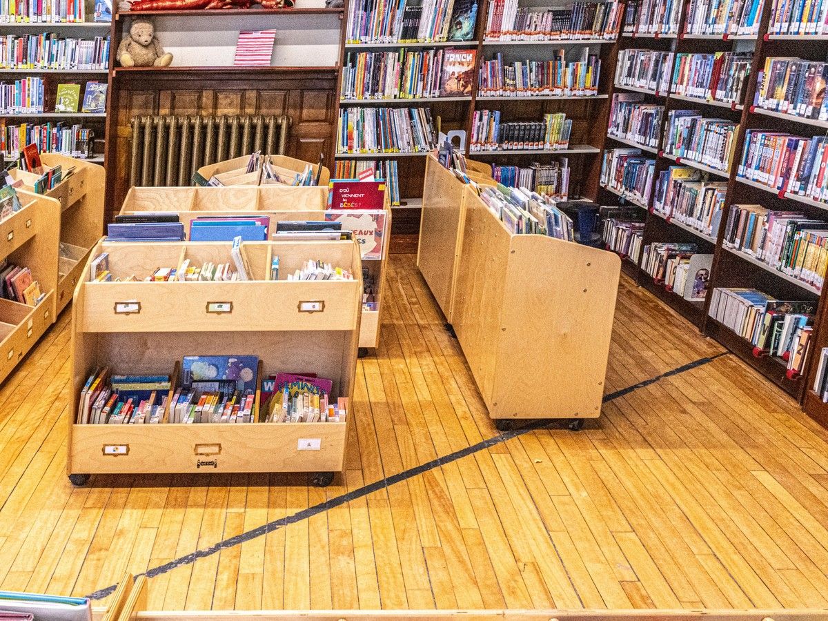 The Haskell Free Library and Opera House has black tape running through marking the border between Canada and the U.S. The Haskell Free Library and Opera House has black tape running through marking the border between Canada and the U.S.