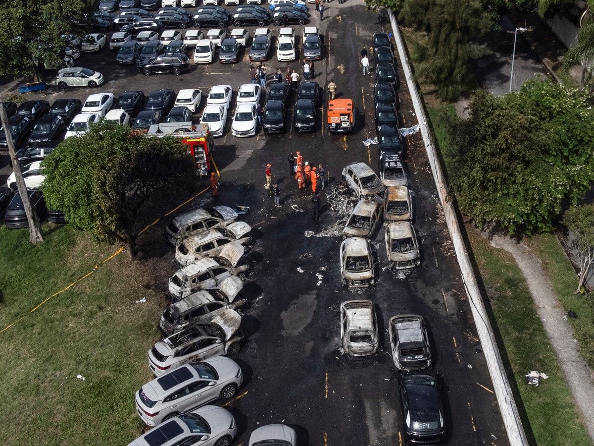 An aerial view shows the aftermath of a helicopter crash