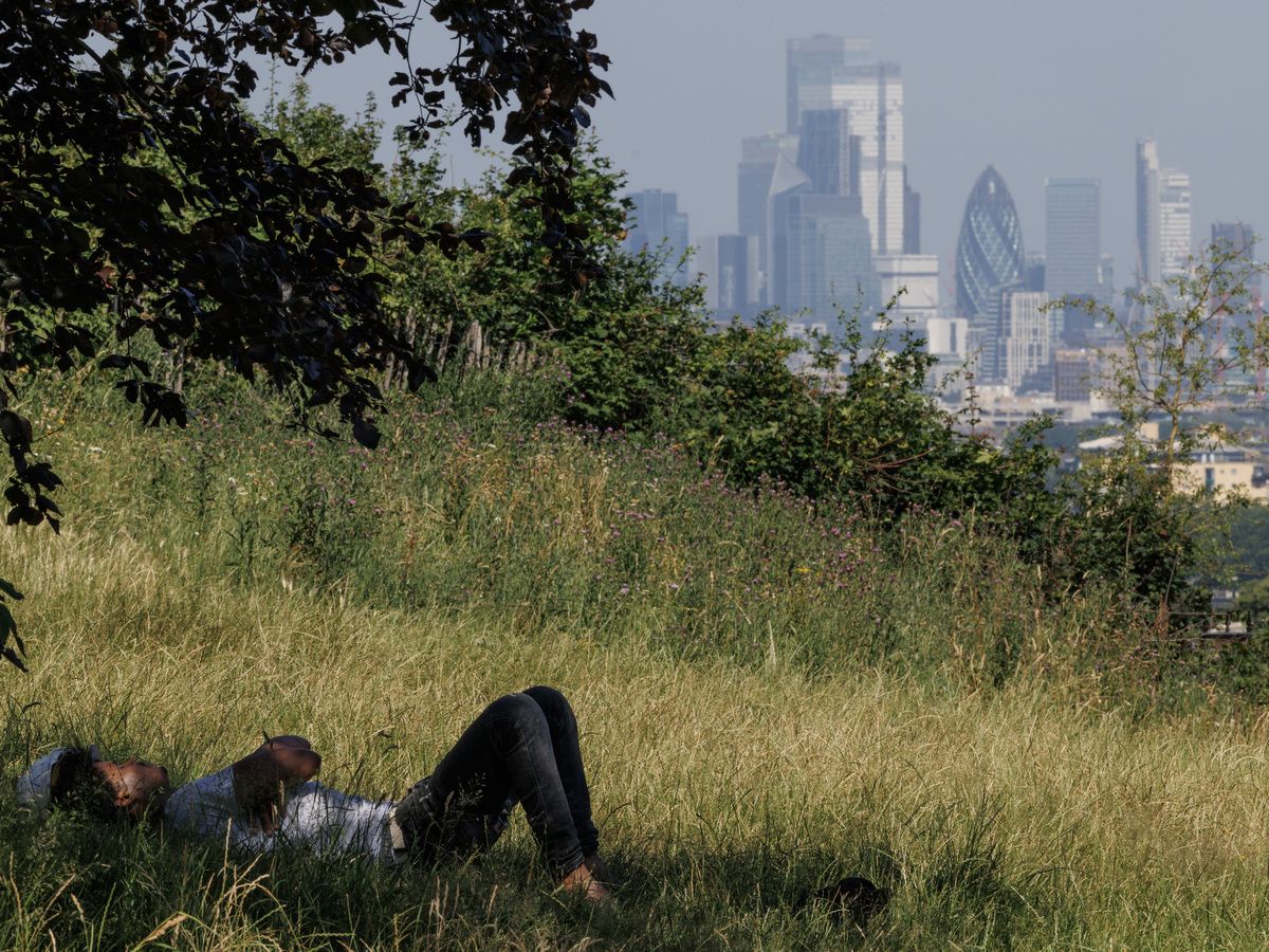 Britain’s heat wave triggers school closures and flash flooding in London