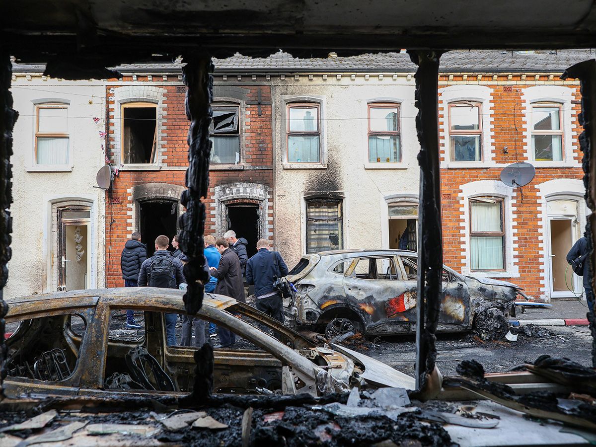 Destroyed cars and buildings.