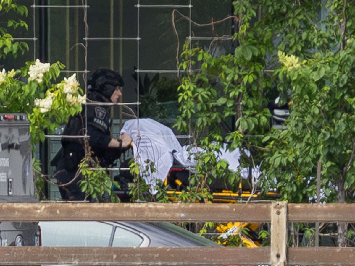  Montreal police officers at the scene of an active shooting situation with a stretcher in Montreal on Monday, June 22, 2026.