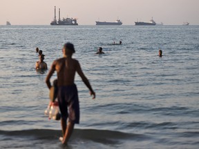 Swimming in the Strait of Hormuz.