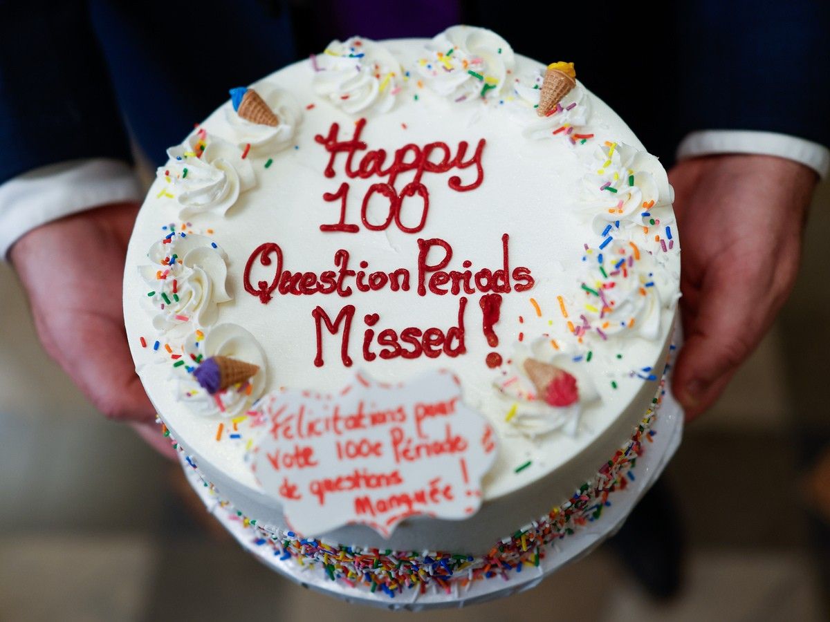 Conservative MP Eric Duncan holds a cake with a message “Happy 100 Question Periods Missed” in the foyer of the House of Commons on June 16, 2026. Conservative MP Eric Duncan holds a cake with a message “Happy 100 Question Periods Missed” in the foyer of the House of Commons on June 16, 2026.