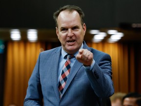 Steven MacKinnon speaking and pointing his finger in the House of Commons.