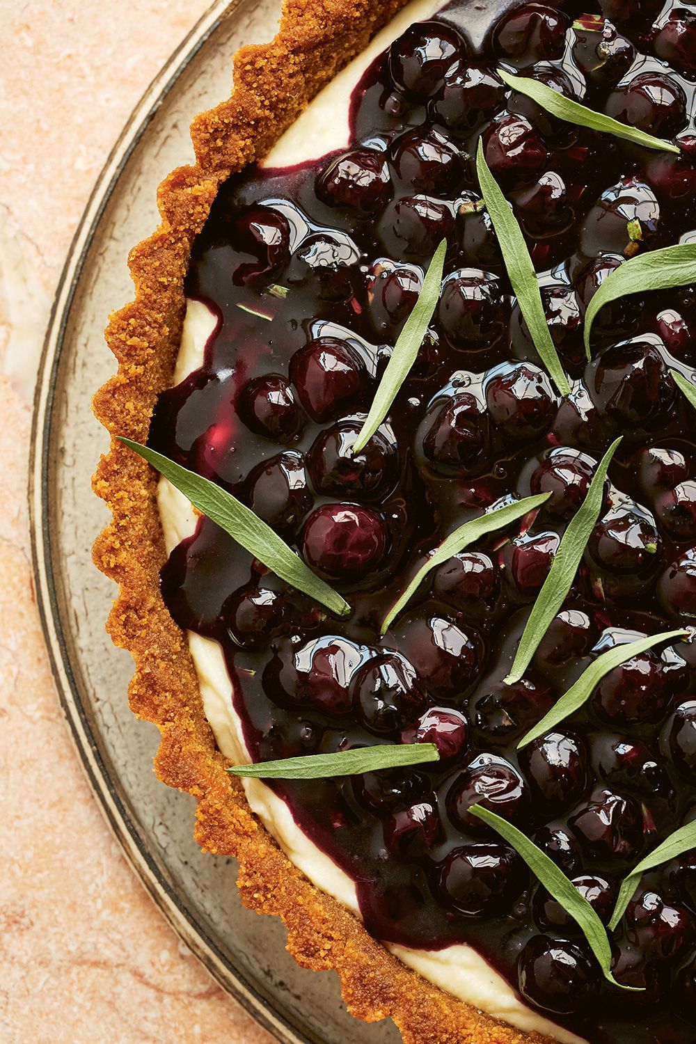 Blueberry tarragon white chocolate cheesecake tart