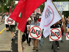 Alto opponents protest against the high-speed rail project on Wednesday, June 10, 2026, in Ottawa, Ont.