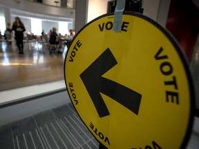 People wait to cast their votes at a polling station at the Canadian Museum of Nature on April 28, 2025 in Ottawa, Canada.