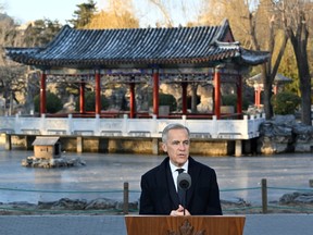 Prime Minister Mark Carney speaks during a press conference at Ritan Park in Beijing on January 16, 2026.