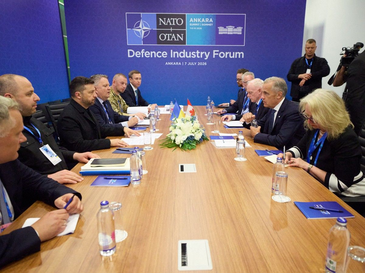  This handout picture released by the press service of Ukraine’s Presidency on July 7, 2026 shows Ukraine’s President Volodymyr Zelensky (3L) speaking with Canada’s Prime Minister Mark Carney (3R) on the sidelines of the 36th NATO Heads of State and Government Summit in Ankara.
