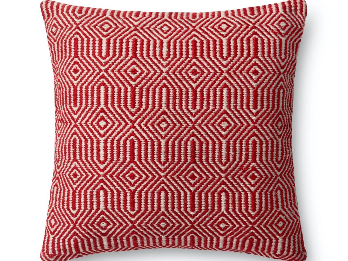 This stylish geometric pillow has Swedish flair. Red and Ivory Pillow (P0339) by Loloi, $119 (sale price), unionlighting.com