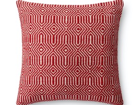 This stylish geometric pillow has Swedish flair. Red and Ivory Pillow (P0339) by Loloi, $119 (sale price), unionlighting.com