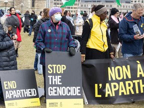 Protesters with signs.