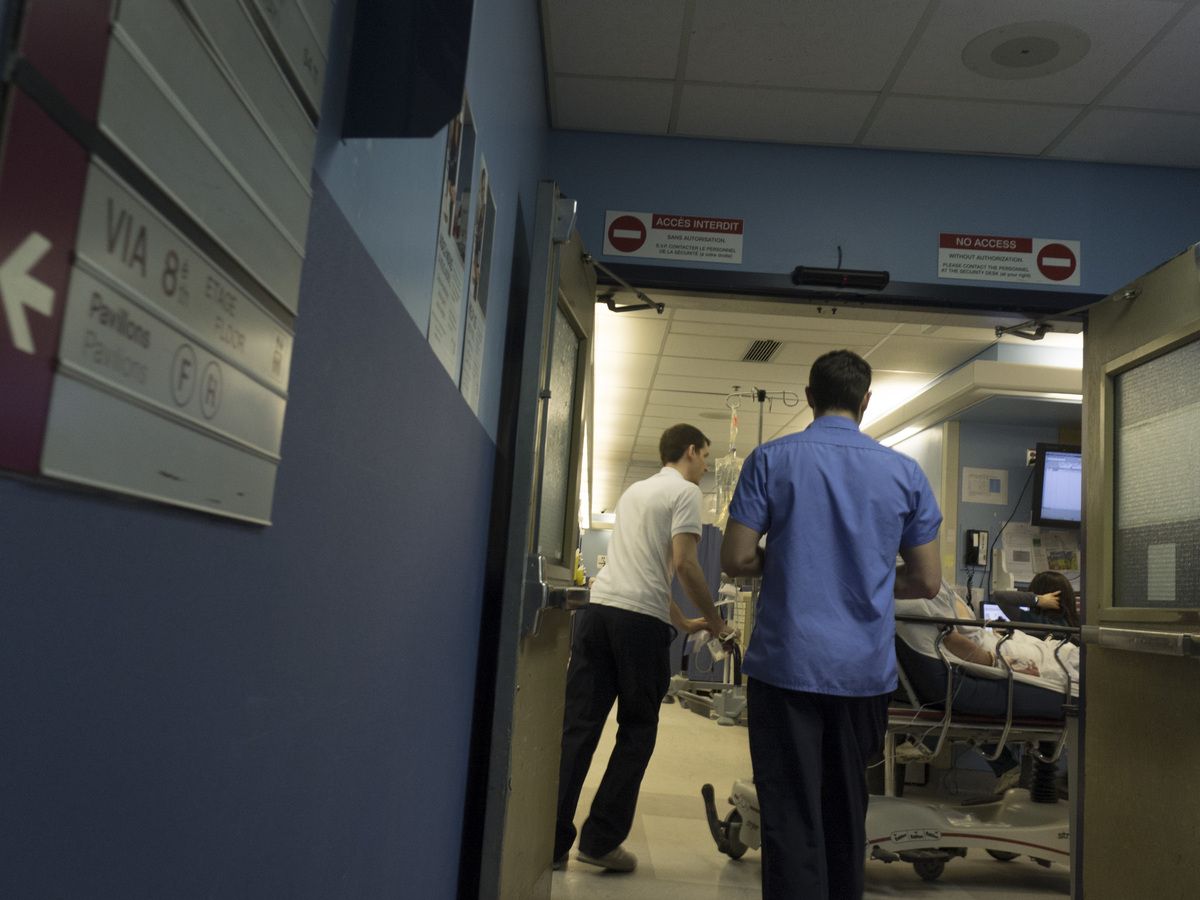 A patient is wheeled on a stretcher into Montreal’s Royal Victoria Hospital’s emergency room. A patient is wheeled on a stretcher into Montreal’s Royal Victoria Hospital’s emergency room.