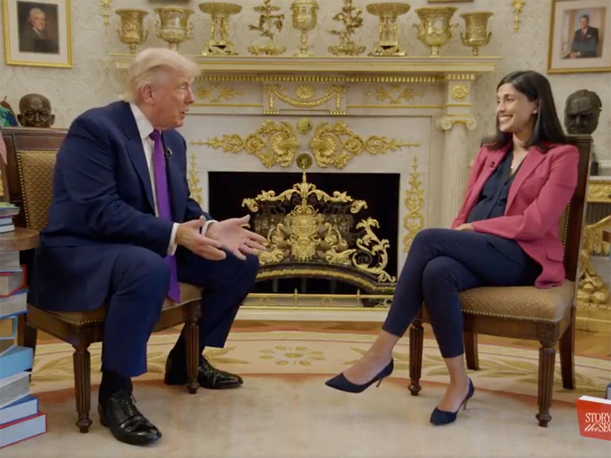 U.S. President Donald Trump speaks with Usha Vance for her "Storytime with the Second Lady" podcast, in the Oval Office of the White House.